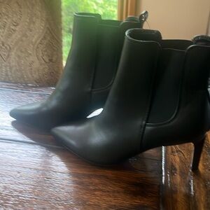 A new woman Calvin Klein black boot